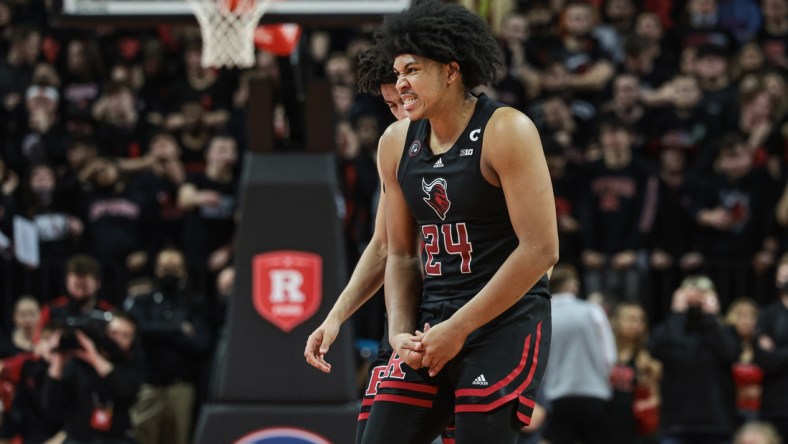 Feb 16, 2022; Piscataway, New Jersey, USA; Rutgers Scarlet Knights forward Ron Harper Jr. (24) reacts after an injury during the second half against the Illinois Fighting Illini at Jersey Mike's Arena. Mandatory Credit: Vincent Carchietta-USA TODAY Sports