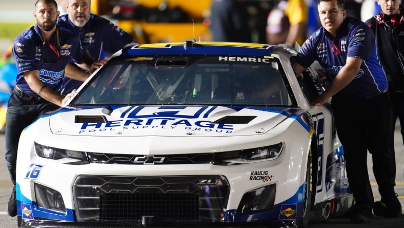 Feb 16, 2022; Daytona, FL, USA; NASCAR Cup Series driver Daniel Hemric (16) crew pushes his car down pit road during qualifying for the Daytona 500 at Daytona International Speedway. Mandatory Credit: John David Mercer-USA TODAY Sports