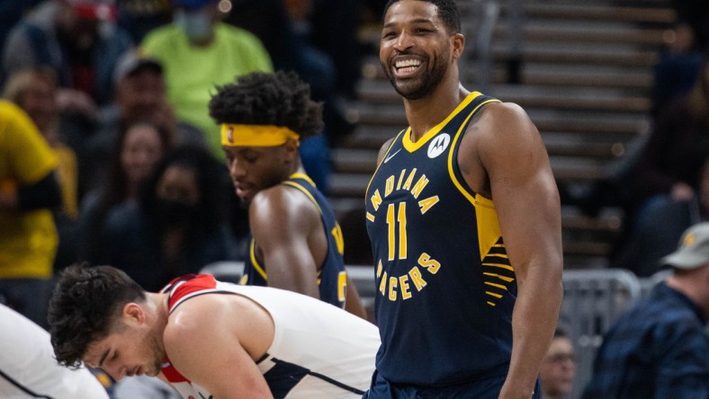 Feb 16, 2022; Indianapolis, Indiana, USA; Indiana Pacers center Tristan Thompson (11) celebrates a made basket in the first half against the Washington Wizards at Gainbridge Fieldhouse. Mandatory Credit: Trevor Ruszkowski-USA TODAY Sports