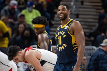 Feb 16, 2022; Indianapolis, Indiana, USA; Indiana Pacers center Tristan Thompson (11) celebrates a made basket in the first half against the Washington Wizards at Gainbridge Fieldhouse. Mandatory Credit: Trevor Ruszkowski-USA TODAY Sports