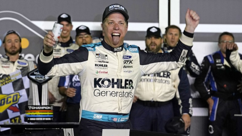 Feb 17, 2022; Daytona, FL, USA; NASCAR Cup Series driver Brad Keselowski (6) reacts after winning the Bluegreen Vacations Duel 1 at Daytona International Speedway. Mandatory Credit: Mike Dinovo-USA TODAY Sports