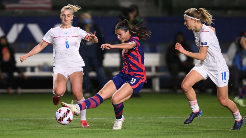 Feb 17, 2022; Carson, California, USA; United States forward Sophia Smith (11) takes a shot on goal past Czech Republic defender Gabriela   lajsov   (5) in the first half during a 2022 She Believes Cup international soccer match at Dignity Health Sports Park. Mandatory Credit: Orlando Ramirez-USA TODAY Sports