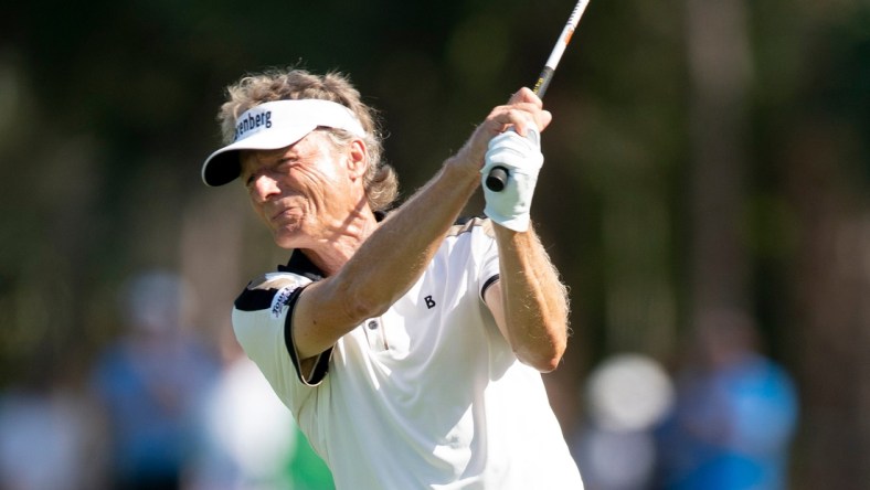 Bernhard Langer (GER) hits an approach shot from the fairway of the 18th hole during the first round of the Chubb Classic, Friday, Feb. 18, 2022, at Tibur  n Golf Club at The Ritz-Carlton Golf Resort in Naples, Fla.

Chubb Classic first round, Feb. 18, 2022