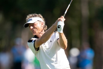 Bernhard Langer (GER) hits an approach shot from the fairway of the 18th hole during the first round of the Chubb Classic, Friday, Feb. 18, 2022, at Tibur  n Golf Club at The Ritz-Carlton Golf Resort in Naples, Fla.

Chubb Classic first round, Feb. 18, 2022