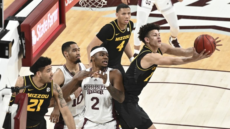 Feb 18, 2022; Starkville, Mississippi, USA; Missouri Tigers forward Trevon Brazile (23) rebounds the ball against the Mississippi State Bulldogs during the first half at Humphrey Coliseum. Mandatory Credit: Matt Bush-USA TODAY Sports