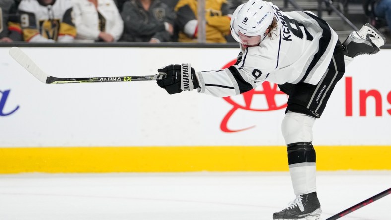 Feb 18, 2022; Las Vegas, Nevada, USA; Los Angeles Kings center Adrian Kempe (9) shoots during the first period against the Vegas Golden Knights at T-Mobile Arena. Mandatory Credit: Stephen R. Sylvanie-USA TODAY Sports