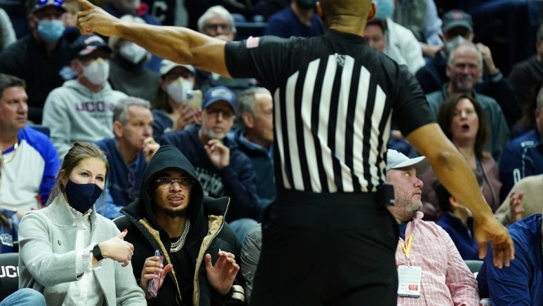 Feb 19, 2022; Storrs, Connecticut, USA; Charlotte Hornets guard and former Connecticut Huskies player James Bouknight is removed from the game by an official in the second quarter against the Xavier Musketeers at Harry A. Gampel Pavilion. Mandatory Credit: David Butler II-USA TODAY Sports