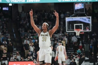 Feb 19, 2022; Winston-Salem, North Carolina, USA; Wake Forest Demon Deacons guard Alondes Williams (31) acknowledges the fans in the closing seconds against the Notre Dame Fighting Irish during the second half at Lawrence Joel Veterans Memorial Coliseum. Mandatory Credit: Jim Dedmon-USA TODAY Sports