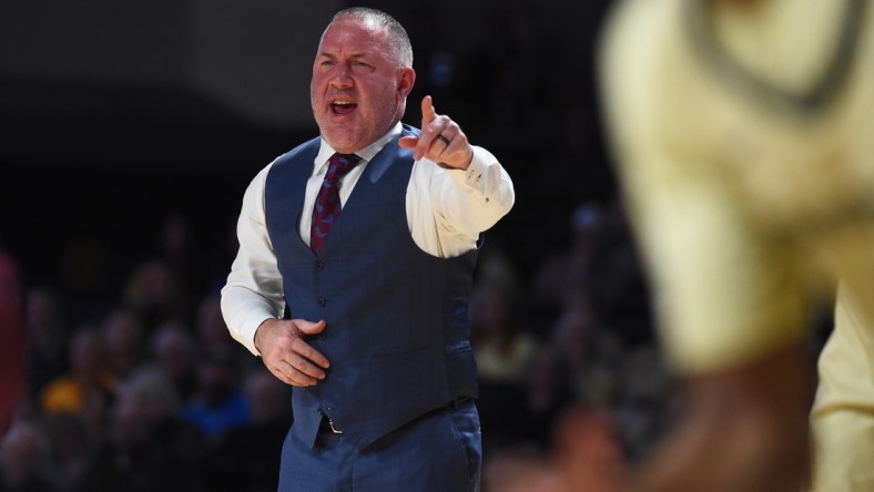 Feb 19, 2022; Nashville, Tennessee, USA; Texas A&M Aggies head coach Buzz Williams yells from the sideline during the first half against the Vanderbilt Commodores at Memorial Gymnasium. Mandatory Credit: Christopher Hanewinckel-USA TODAY Sports