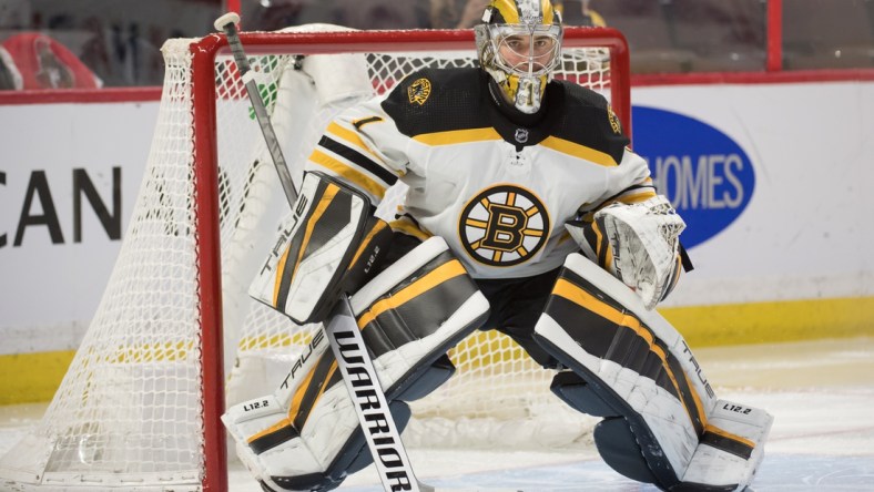 Feb 19, 2022; Ottawa, Ontario, CAN; Boston Bruins goalie Jeremy Swayman (1) warms up prior to the start of game against the Ottawa Senators at the Canadian Tire Centre. Mandatory Credit: Marc DesRosiers-USA TODAY Sports