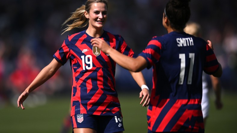 Feb 20, 2022; Carson, California, USA; United States defender Emily Fox (19) and forward Sophia Smith (11) celebrate after an own goal by New Zealand during the first half in a 2022 SheBelieves Cup international soccer match at Dignity Health Sports Park. Mandatory Credit: Orlando Ramirez-USA TODAY Sports