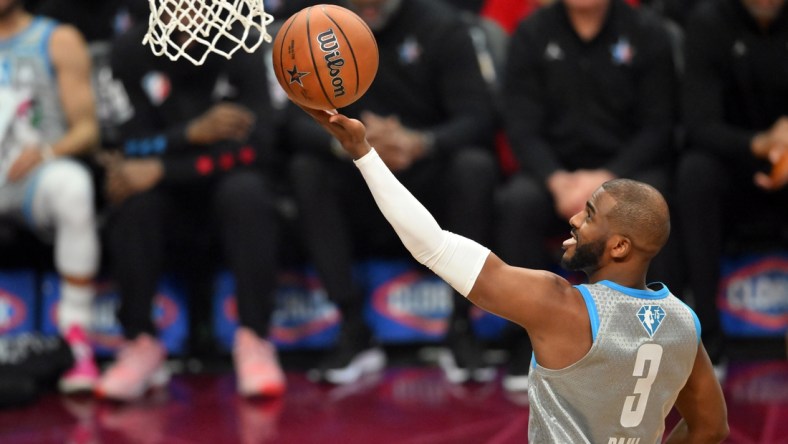 Feb 20, 2022; Cleveland, Ohio, USA; Team LeBron guard Chris Paul (3) shoots against Team Durant in the first quarter during the 2022 NBA All-Star Game at Rocket Mortgage FieldHouse. Mandatory Credit: David Richard-USA TODAY Sports