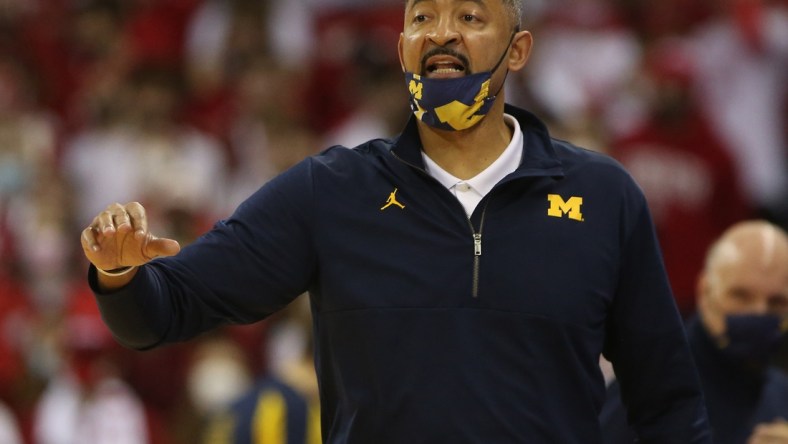 Feb 20, 2022; Madison, Wisconsin, USA; Michigan Wolverines head coach Juwan Howard  directs his team during the game with the Wisconsin Badgers at the Kohl Center. Mandatory Credit: Mary Langenfeld-USA TODAY Sports