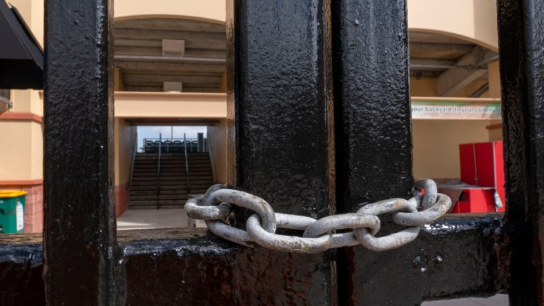 The gates are locked during the MLB lockout delaying spring training at Roger Dean Stadium in Jupiter, Florida on February 22, 2022.