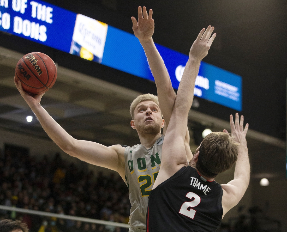 Feb 24, 2022; San Francisco, California, USA; San Francisco Dons forward Yauhen Massalski (25) goes up for a shot over Gonzaga Bulldogs forward Drew Timme (2) during the first half at War Memorial at the Sobrato Center. Mandatory Credit: D. Ross Cameron-USA TODAY Sports