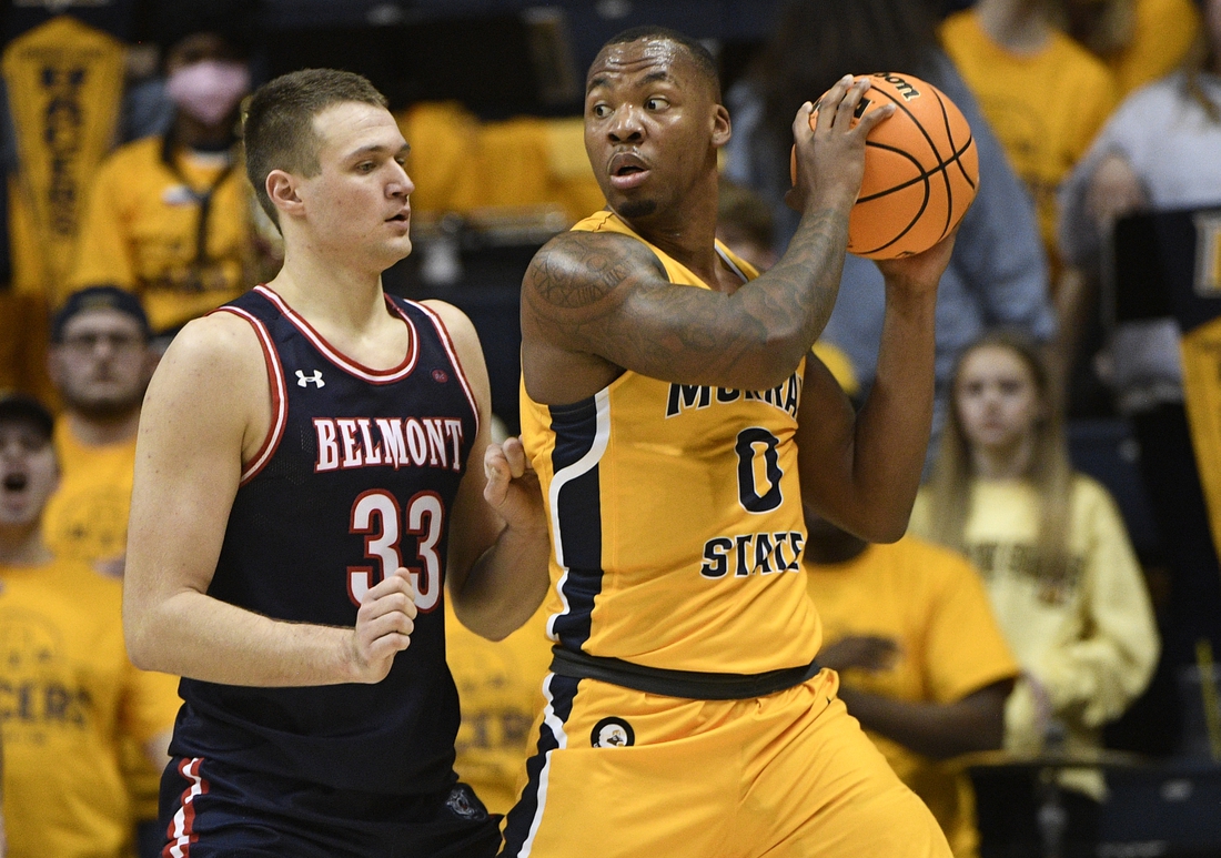 Feb 24, 2022; Murray, Kentucky, USA;  Murray State Racers forward KJ Williams (0) backs down Belmont Bruins center Nick Muszynski (33) during first half at CFSB Center. Mandatory Credit: Steve Roberts-USA TODAY Sports