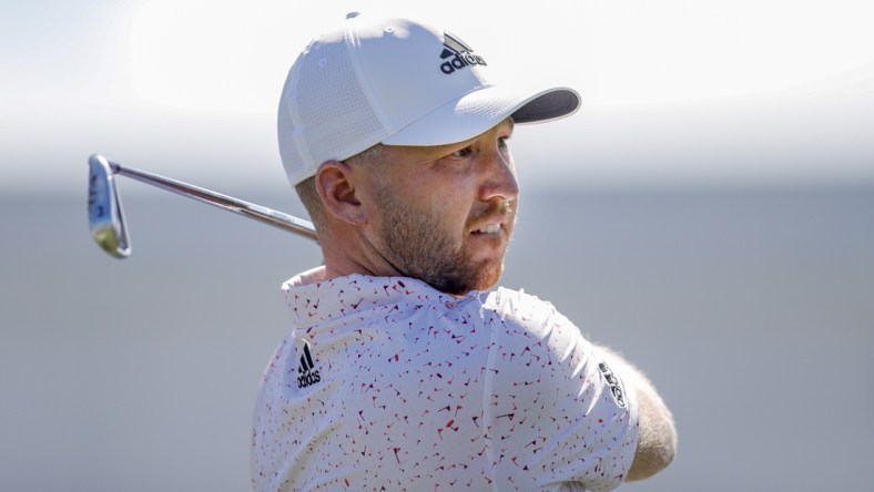 Feb 25, 2022; Palm Beach Gardens, Florida, USA; Daniel Berger watches his shot from the fourth tee during the second round of The Honda Classic golf tournament. Mandatory Credit: Sam Navarro-USA TODAY Sports