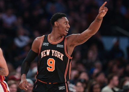Feb 25, 2022; New York, New York, USA; New York Knicks guard RJ Barrett (9) reacts after a basket against the Miami Heat during the first half at Madison Square Garden. Mandatory Credit: Vincent Carchietta-USA TODAY Sports