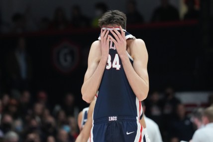Feb 26, 2022; Moraga, California, USA; Gonzaga Bulldogs center Chet Holmgren (34) wipes his face with his jersey during the second half against the Saint Mary's Gaels at University Credit Union Pavilion. Mandatory Credit: Darren Yamashita-USA TODAY Sports