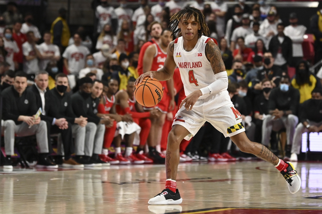 Feb 27, 2022; College Park, Maryland, USA;  Maryland Terrapins guard Fatts Russell (4) dribbles down the court during the second half Ohio State Buckeyes at Xfinity Center. Mandatory Credit: Tommy Gilligan-USA TODAY Sports