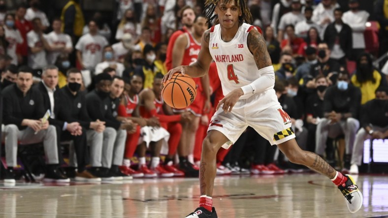 Feb 27, 2022; College Park, Maryland, USA;  Maryland Terrapins guard Fatts Russell (4) dribbles down the court during the second half Ohio State Buckeyes at Xfinity Center. Mandatory Credit: Tommy Gilligan-USA TODAY Sports