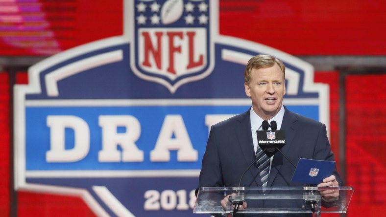 Apr 26, 2018; Arlington, TX, USA; NFL commissioner Roger Goodell speaks at the podium in the first round of the 2018 NFL Draft at AT&T Stadium.  Mandatory Credit: Tim Heitman-USA TODAY Sports