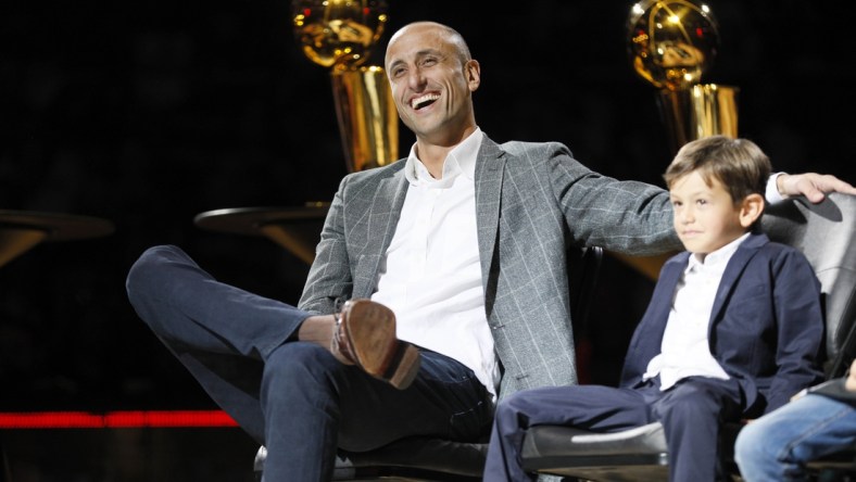 Mar 28, 2019; San Antonio, TX, USA; San Antonio Spurs former player Manu Ginobili reacts during his jersey retirement ceremony at AT&T Center after a game between the Cleveland Cavaliers and San Antonio Spurs. Mandatory Credit: Soobum Im-USA TODAY Sports