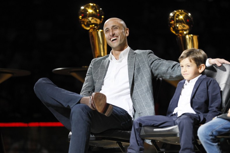 Mar 28, 2019; San Antonio, TX, USA; San Antonio Spurs former player Manu Ginobili reacts during his jersey retirement ceremony at AT&T Center after a game between the Cleveland Cavaliers and San Antonio Spurs. Mandatory Credit: Soobum Im-USA TODAY Sports