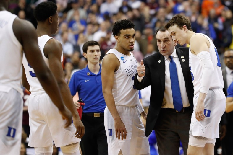 Mar 29, 2019; Washington, DC, USA; Duke Blue Devils head coach Mike Krzyzewski talks to his team against the Virginia Tech Hokies in the semifinals of the east regional of the 2019 NCAA Tournament at Capital One Arena. Mandatory Credit: Geoff Burke-USA TODAY Sports