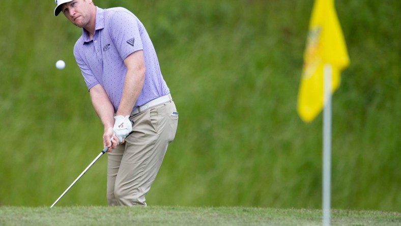 Ryan Brehm chips the ball into the cup during the first round of the Web.com Robert Trent Jones Golf Trail Championship in Prattville, Ala., on Thursday April 17, 2019. 

Golf46