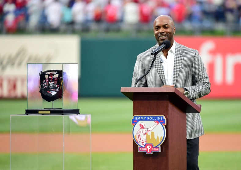 May 4, 2019; Philadelphia, PA, USA; Former Philadelphia Phillies shortstop Jimmy Rollins (center) is honored during his retirement ceremony prior to the game against the Washington Nationals at Citizens Bank Park. Mandatory Credit: Evan Habeeb-USA TODAY Sports