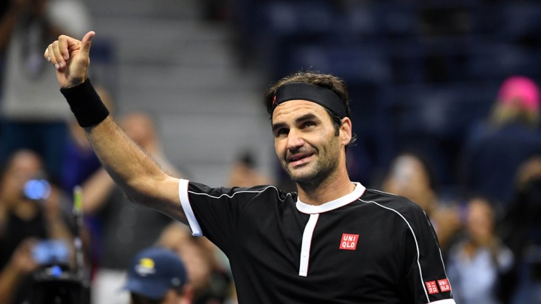 Aug 26, 2019; Flushing, NY, USA; Roger Federer of Switzerland waves to the crowd after his win over Sumit Nagal of India in the first round on day one of the 2019 U.S. Open tennis tournament at USTA Billie Jean King National Tennis Center. Mandatory Credit: Danielle Parhizkaran-USA TODAY Sports