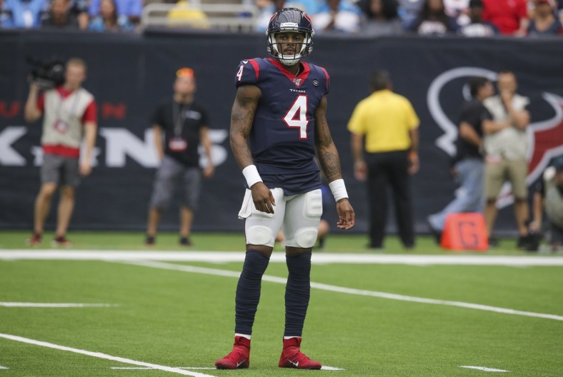 Sep 29, 2019; Houston, TX, USA; Houston Texans quarterback Deshaun Watson (4) looks to the sidelines for the last play before throwing a Hail Mary pass against the Carolina Panthers late in the fourth quarter at NRG Stadium. Mandatory Credit: Thomas B. Shea-USA TODAY Sports