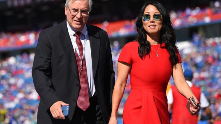 Oct 20, 2019; Orchard Park, NY, USA; Buffalo Bills owners Terry and Kim Pegula walk on the field prior to the game against the Miami Dolphins at New Era Field. Mandatory Credit: Rich Barnes-USA TODAY Sports