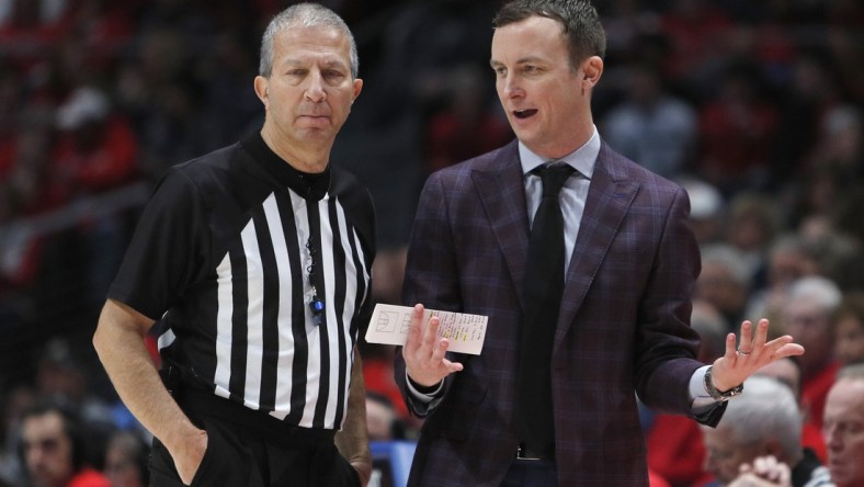 Jan 11, 2020; Dayton, Ohio, USA; Massachusetts Minutemen head coach Matt McCall talks to a referee during the first half against the Dayton Flyers at University of Dayton Arena. Mandatory Credit: David Kohl-USA TODAY Sports