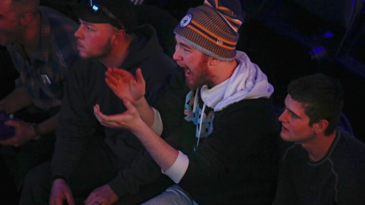 Jan 24, 2020; Minneapolis, Minnesota, USA; A fan cheers as the Dallas Empire play against the Chicago Huntsmen during the Call of Duty League Launch Weekend at The Armory. Mandatory Credit: Bruce Kluckhohn-USA TODAY Sports