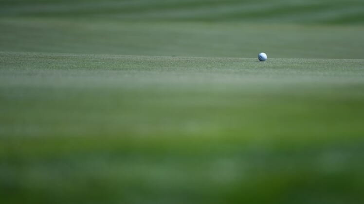 Mar 12, 2020; Ponte Vedra Beach, Florida, USA; A general view of a golf ball on the 18th hole during the first round of the 2020 edition of The Players Championship golf tournament at TPC Sawgrass - Stadium Course. Mandatory Credit: Adam Hagy-USA TODAY Sports