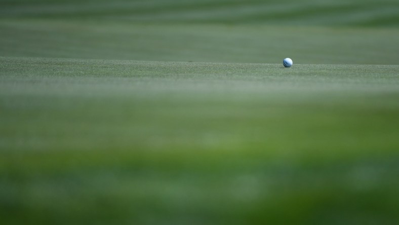 Mar 12, 2020; Ponte Vedra Beach, Florida, USA; A general view of a golf ball on the 18th hole during the first round of the 2020 edition of The Players Championship golf tournament at TPC Sawgrass - Stadium Course. Mandatory Credit: Adam Hagy-USA TODAY Sports