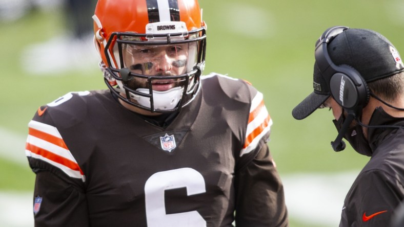 Nov 15, 2020; Cleveland, Ohio, USA; Cleveland Browns quarterback Baker Mayfield (6) talks with head coach Kevin Stefanski during the two-minute warning during the second quarter against the Houston Texans at FirstEnergy Stadium. Mandatory Credit: Scott Galvin-USA TODAY Sports