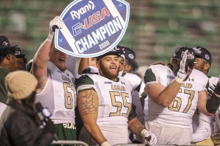 Dec 18, 2020; Huntington, West Virginia, USA; UAB Blazers players celebrate after defeating the Marshall Thundering Herd for the Conference USA Championship at Joan C. Edwards Stadium. Mandatory Credit: Ben Queen-USA TODAY Sports