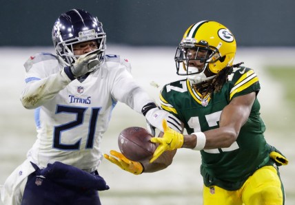 Green Bay Packers wide receiver Davante Adams pulls down a long reception against Tennessee Titans cornerback Malcolm Butler late in the fourth quarter during their football game Sunday, Dec. 27, 2020, at Lambeau Field in Green Bay, Wis.

Apc Packvstitans 1227200917