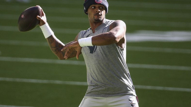 Jan 3, 2021; Houston, Texas, USA; Houston Texans quarterback Deshaun Watson (4) warms up before a game against the Tennessee Titans at NRG Stadium. Mandatory Credit: Troy Taormina-USA TODAY Sports