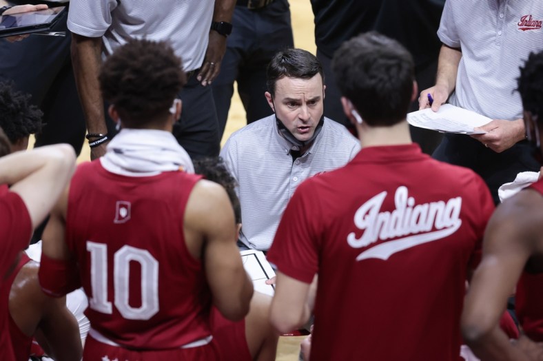 Feb 24, 2021; Piscataway, New Jersey, USA; Indiana Hoosiers head coach Archie Miller talks with his team during the first half against the Rutgers Scarlet Knights at Rutgers Athletic Center (RAC). Mandatory Credit: Vincent Carchietta-USA TODAY Sports