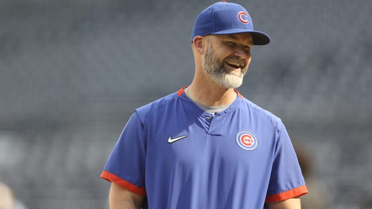 May 25, 2021; Pittsburgh, Pennsylvania, USA;  Chicago Cubs manager David Ross (3) reacts during batting practice before playing the Pittsburgh Pirates at PNC Park. Mandatory Credit: Charles LeClaire-USA TODAY Sports