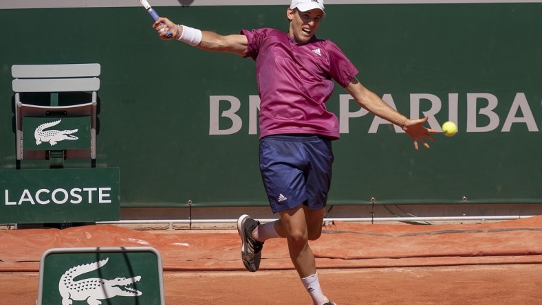 May 30, 2021; Paris, France; Dominic Thiem (AUT) in action during his match against Pablo Andujar (ESP) at Roland Garros Stadium. Mandatory Credit: Susan Mullane-USA TODAY Sports