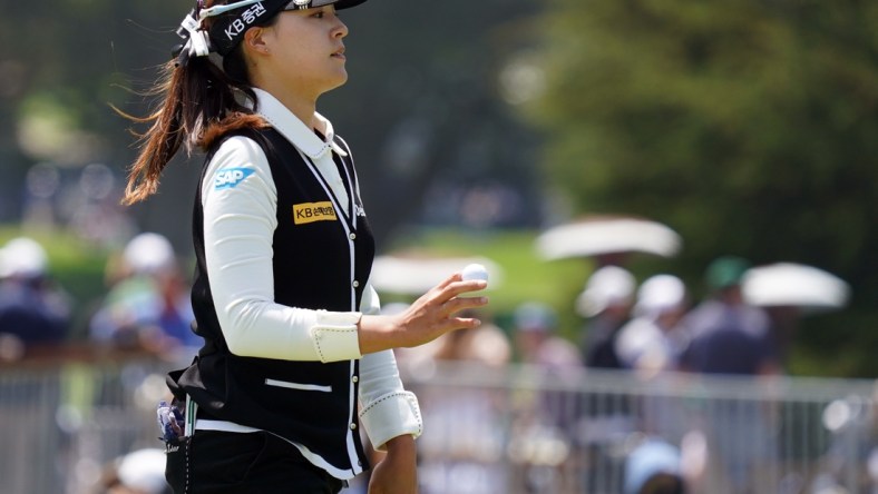 Jun 5, 2021; San Francisco, California, USA; In Gee Chun waves after her putt on the tenth green during the third round of the U.S. Women's Open golf tournament at The Olympic Club. Mandatory Credit: Kyle Terada-USA TODAY Sports