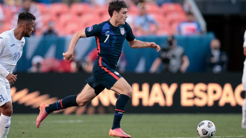 Jun 3, 2021; Denver, Colorado, USA; United States forward Gio Reyna (7) controls the ball in the first half against Honduras during the semifinals of the 2021 CONCACAF Nations League soccer series at Empower Field at Mile High. Mandatory Credit: Isaiah J. Downing-USA TODAY Sports