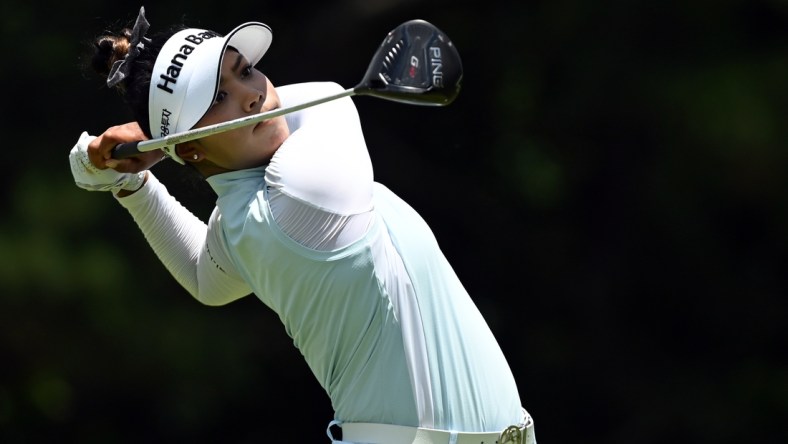 Jun 27, 2021; John's Creek, Georgia, USA; Patty Tavatanakit plays her shot from the second tee during the final round of the KPMG Women's PGA Championship golf tournament at the Atlanta Athletic Club. Mandatory Credit: Adam Hagy-USA TODAY Sports