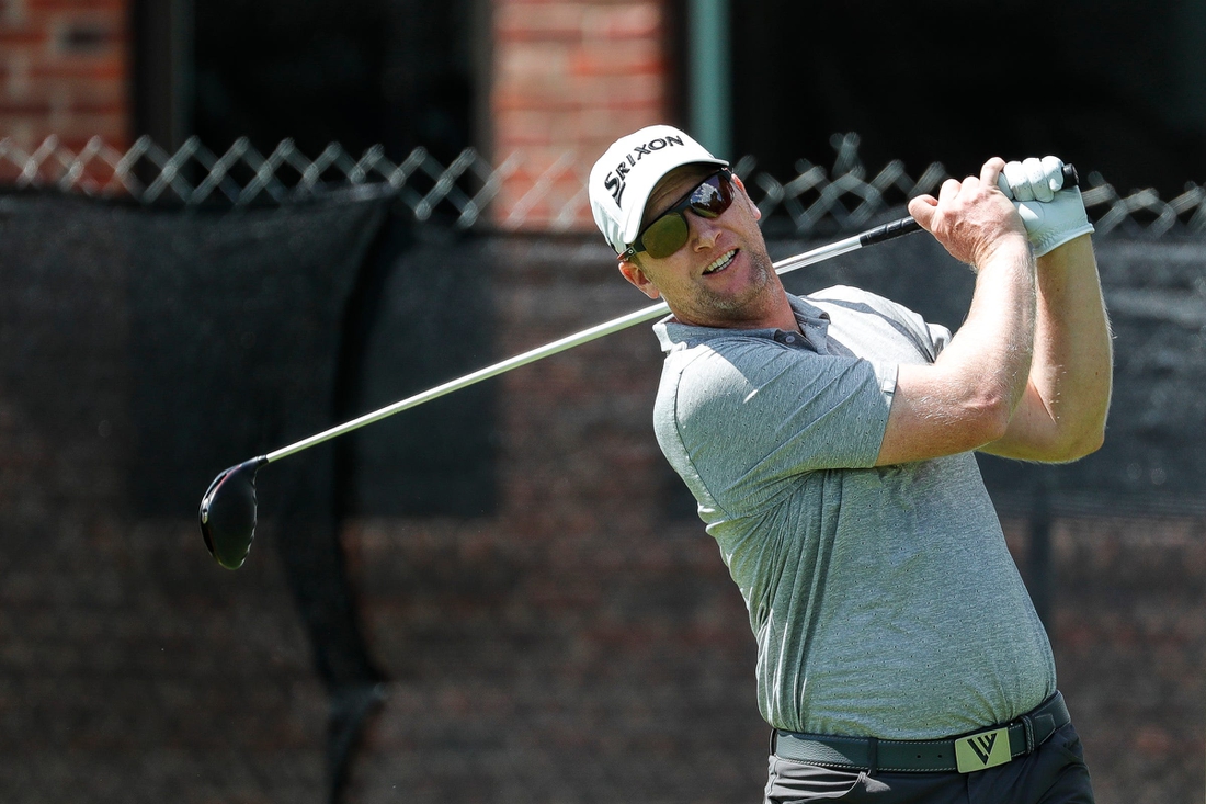 Ryan Brehm tees off on the eighth hole during the second round of the Rocket Mortgage Classic at the Detroit Golf Club in Detroit on Friday, July 2, 2021.