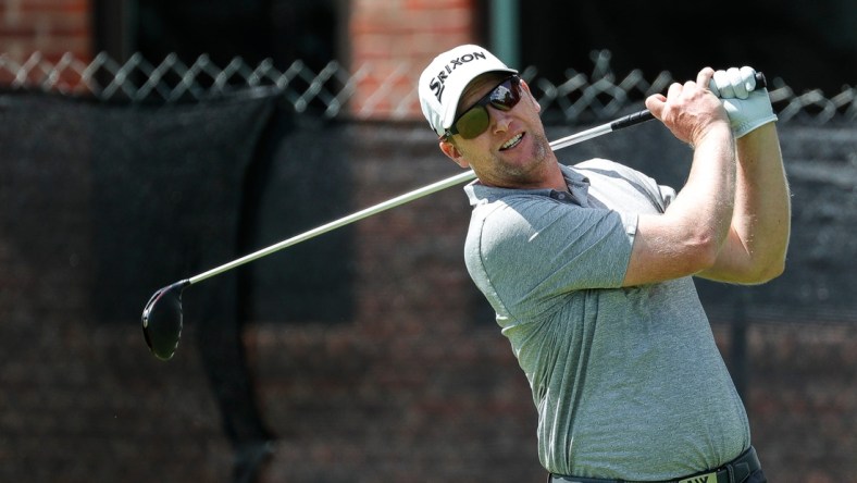 Ryan Brehm tees off on the eighth hole during the second round of the Rocket Mortgage Classic at the Detroit Golf Club in Detroit on Friday, July 2, 2021.